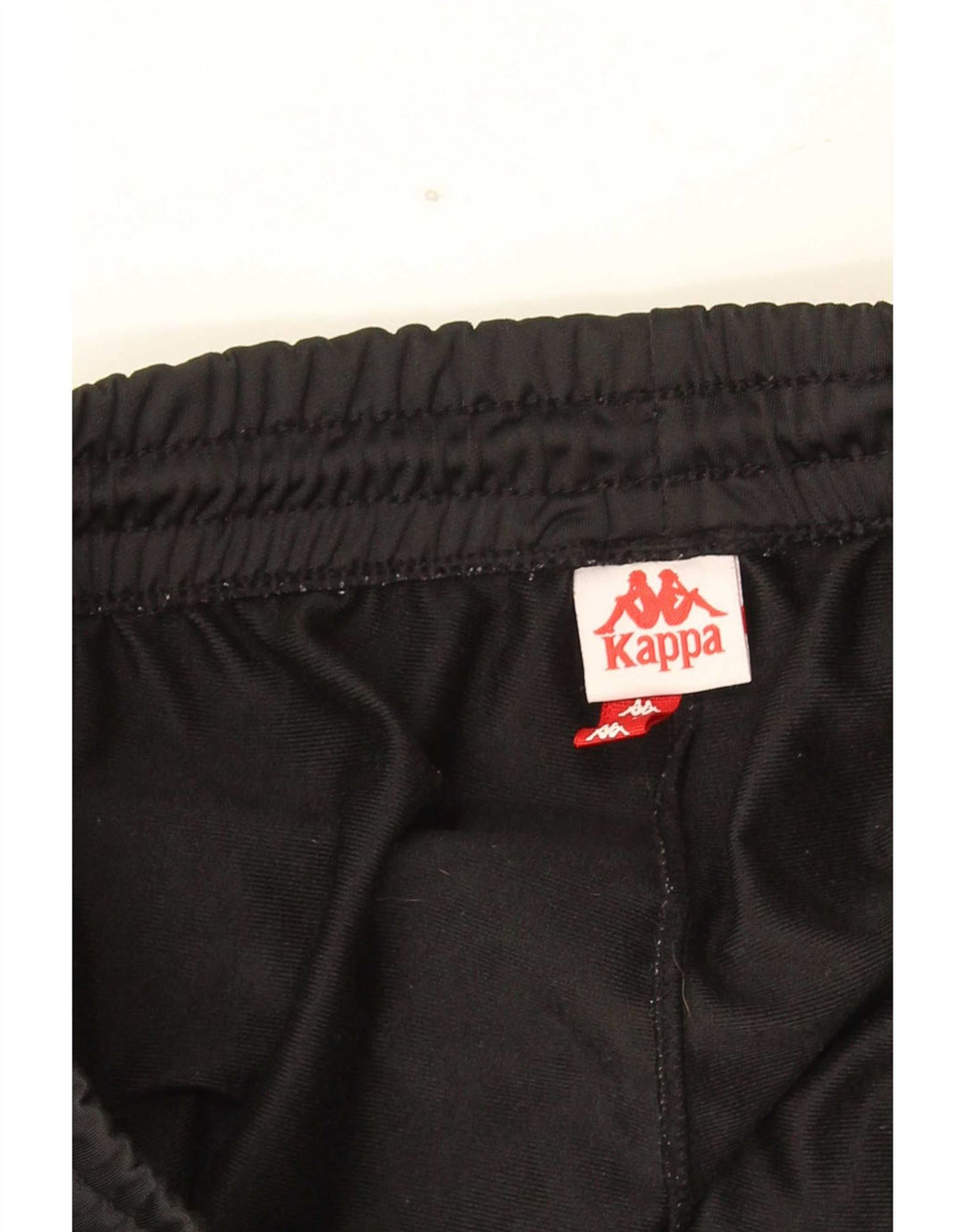 Calça masculina Kappa com estampa gráfica grande bloco colorido preto