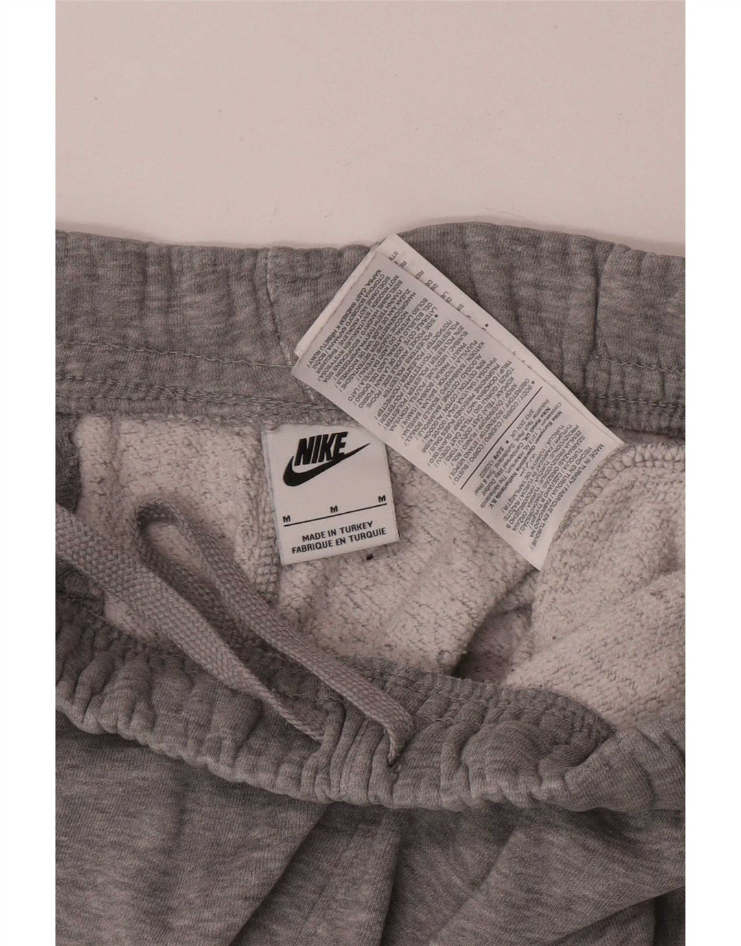 Calça de treino masculina Nike Joggers cinza médio algodão manchado