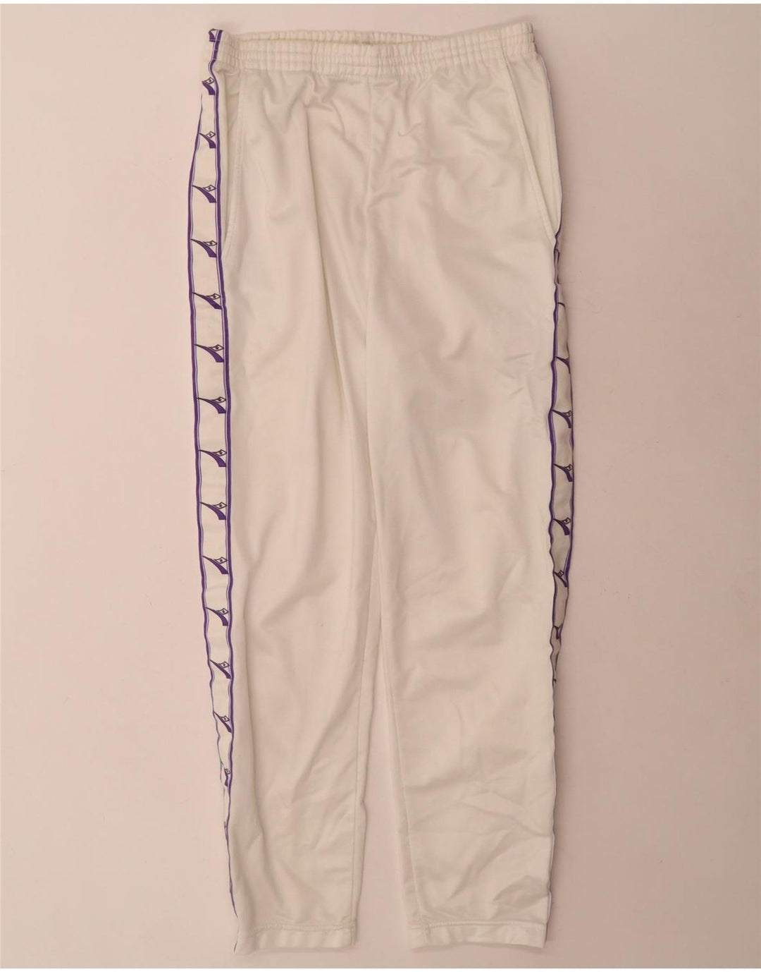 Calça de treino feminina Diadora UK 10 poliéster branco pequeno