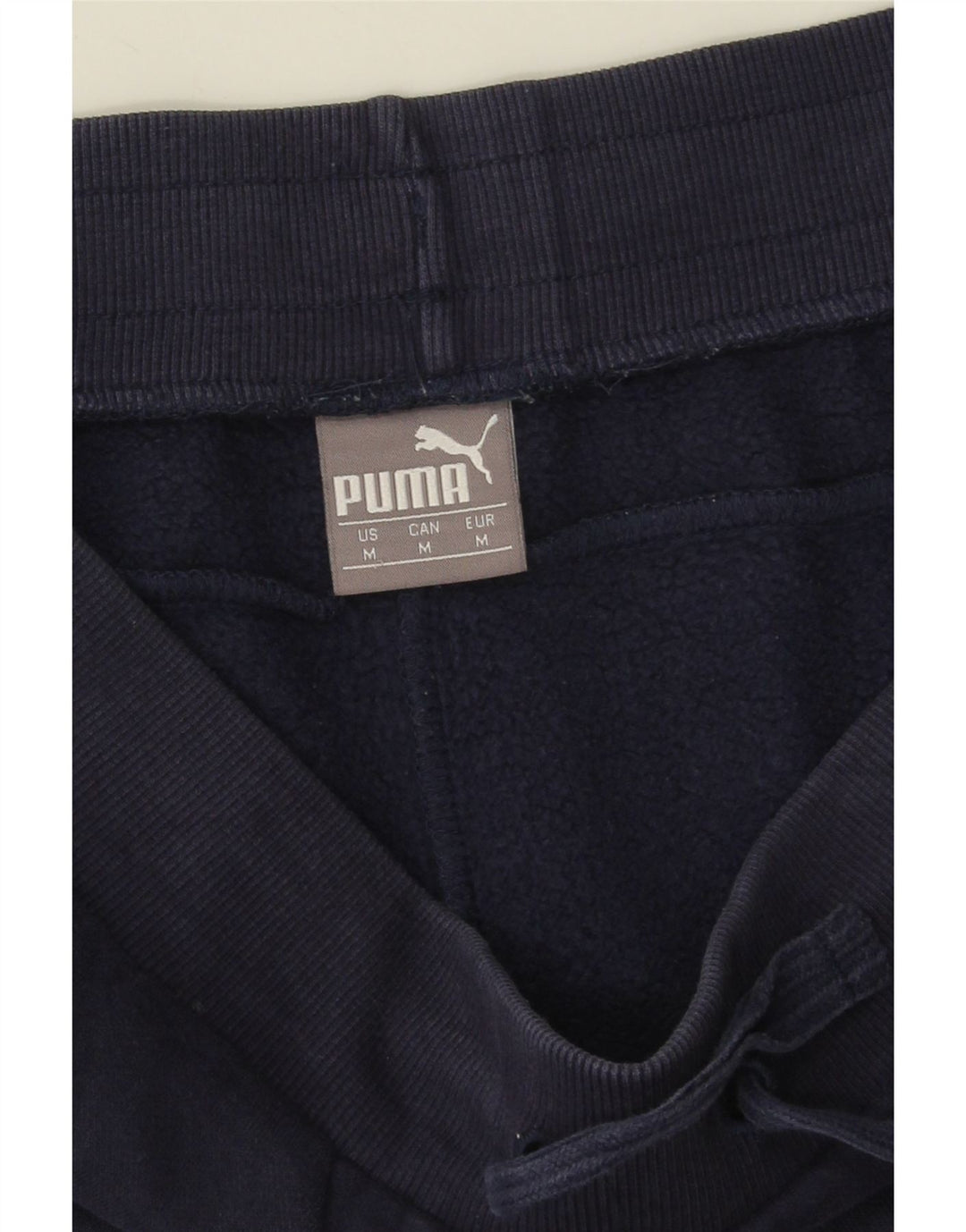 Calça esportiva masculina Puma Graphic Joggers médio algodão azul marinho