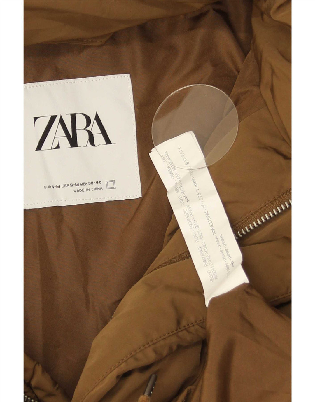 Jaqueta masculina Zara com capuz solto e acolchoado Reino Unido 36 poliéster marrom pequeno