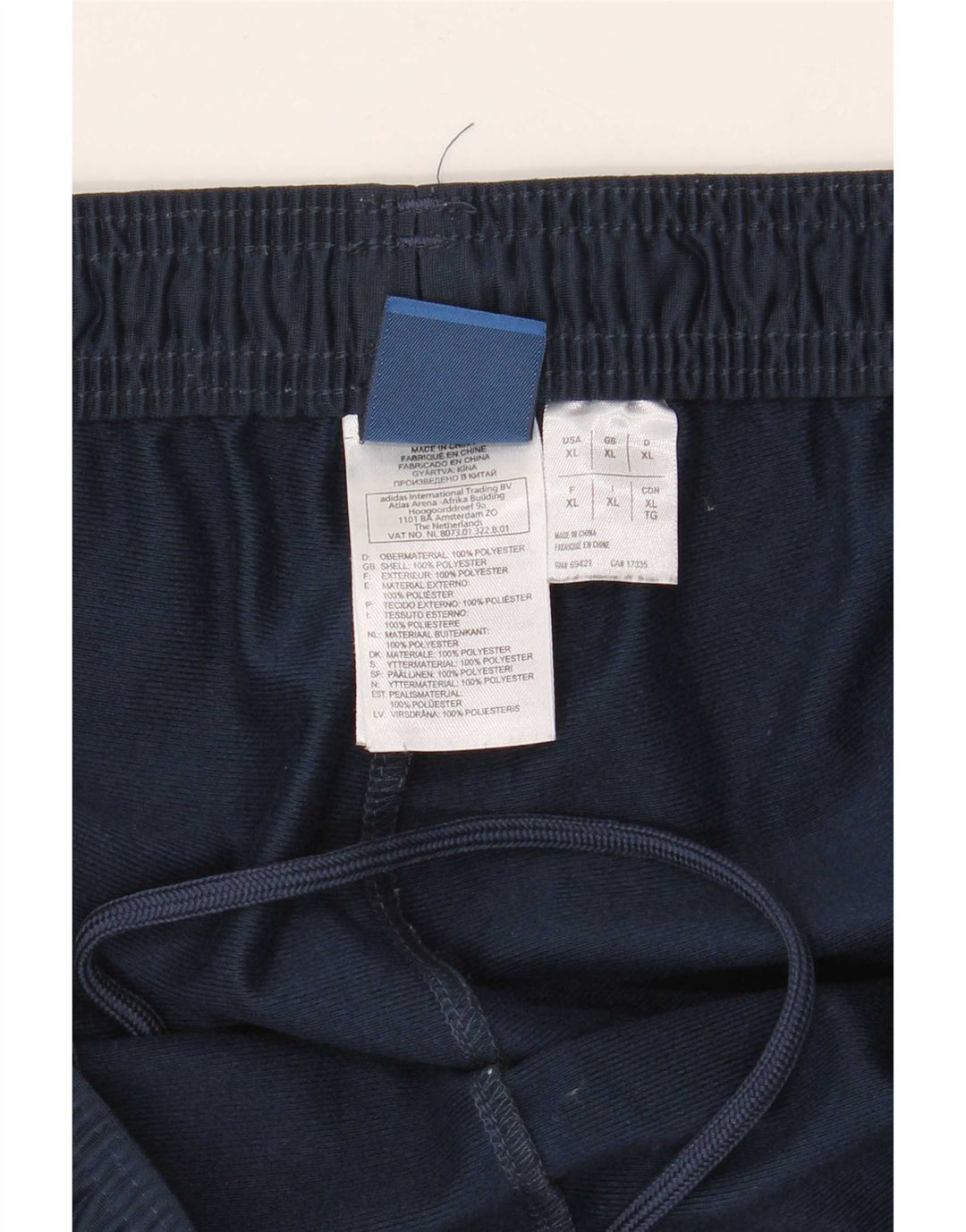 Calça de treino masculina Reebok Graphic XL azul marinho poliéster colorblock