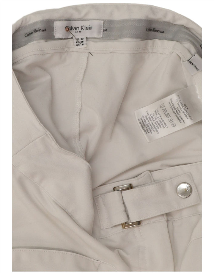 Mini saia feminina Calvin Klein Reino Unido 10 pequena W28 poliéster branco