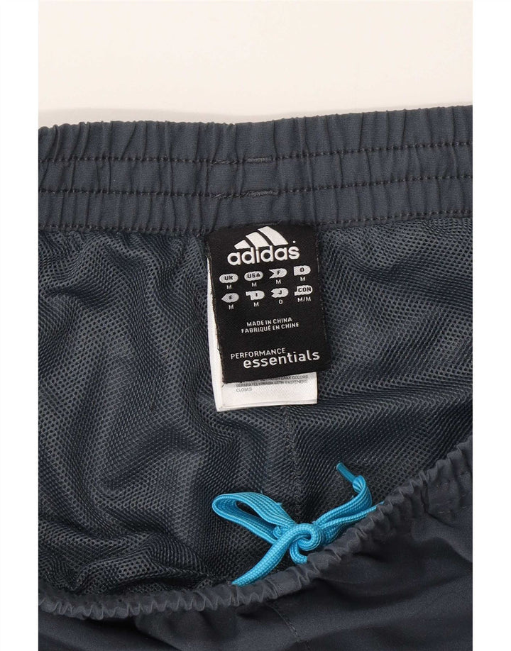 Calça de treino masculina Adidas cinza médio poliéster esportivo