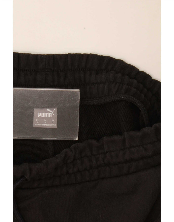 Shorts esportivos femininos Puma UK 14 grandes pretos