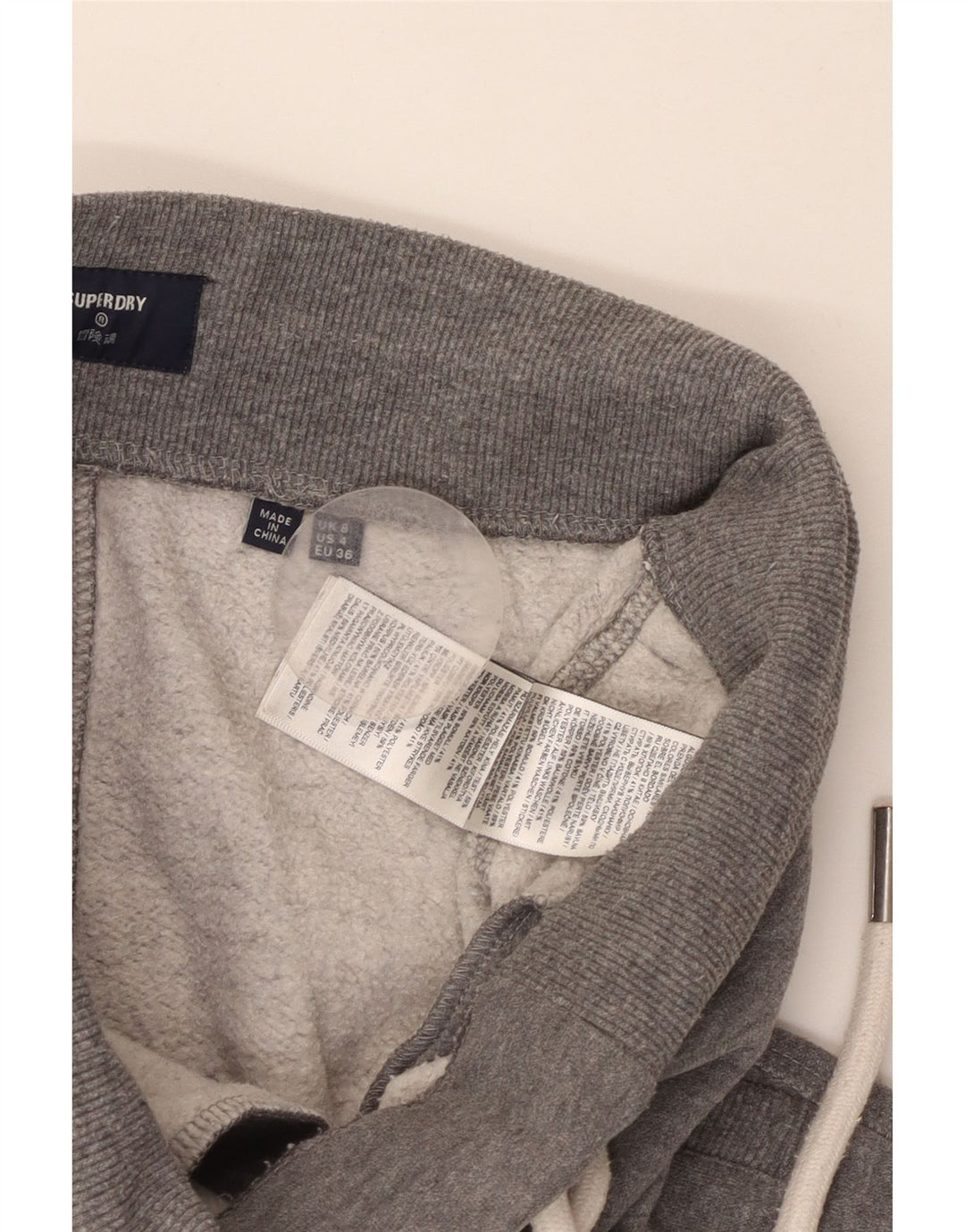 Calça esportiva feminina SUPERDRY com estampa gráfica e jogging UK 8 pequena cinza manchada