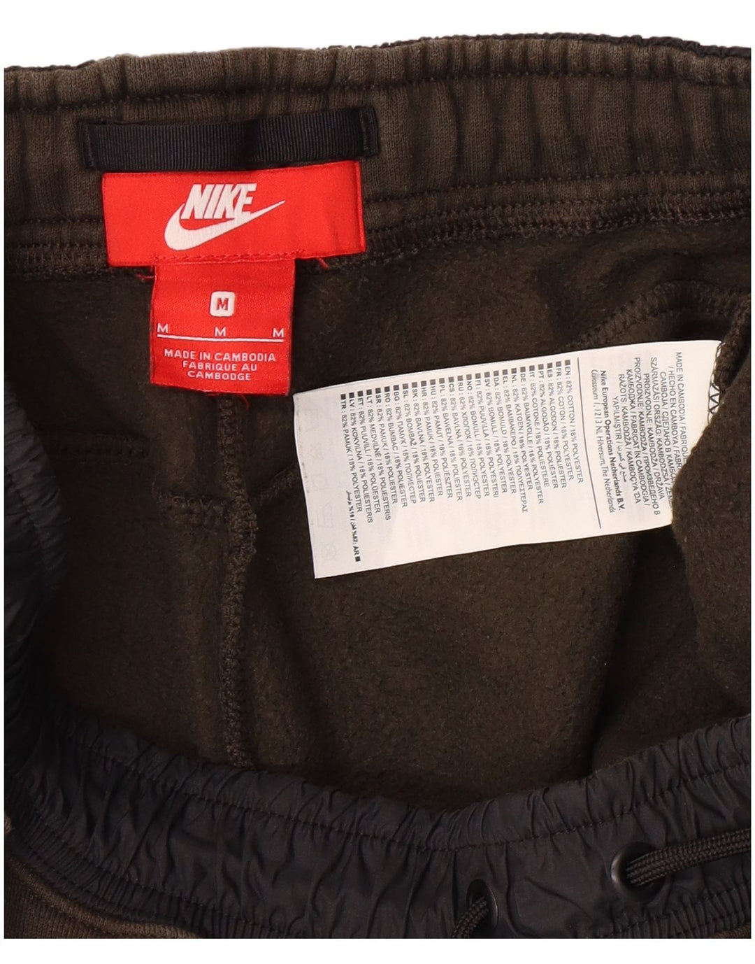 Calça esportiva feminina Nike joggers médio cáqui algodão