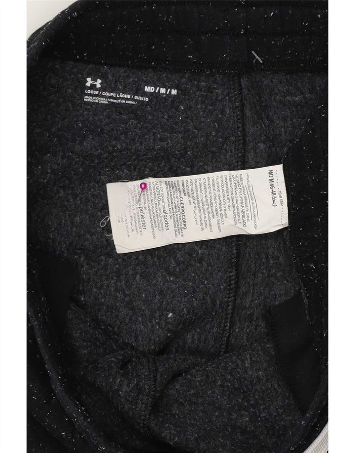 Calça esportiva masculina Under Armour Graphic Joggers médio preto manchado