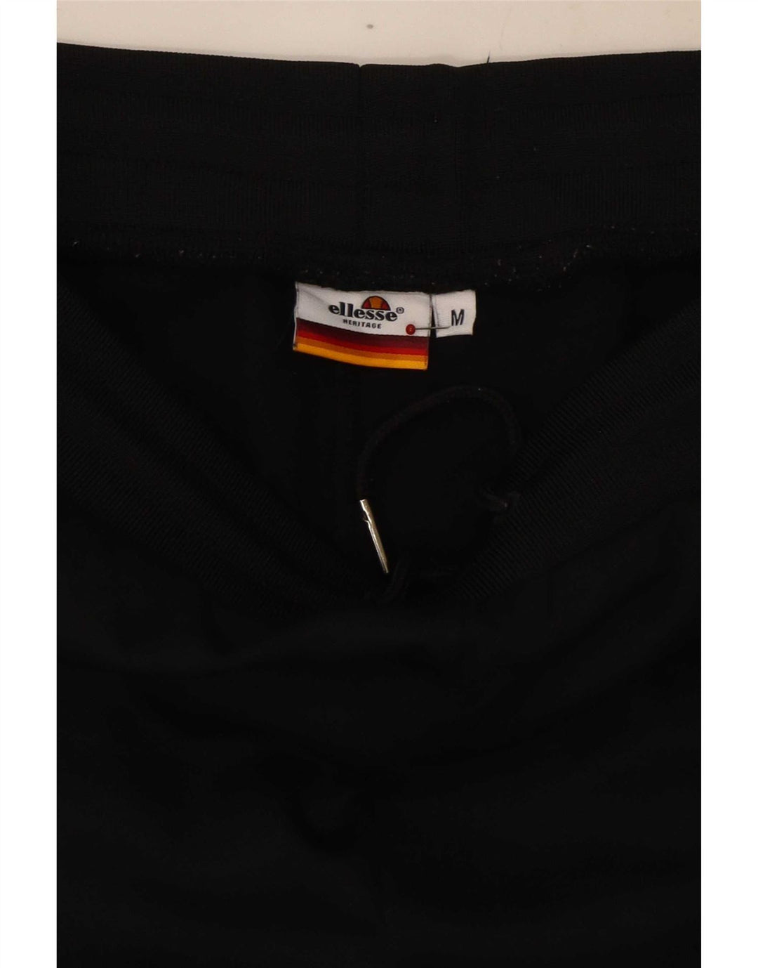 Calça de treino masculina Ellesse com estampa gráfica média preta de algodão colorblock