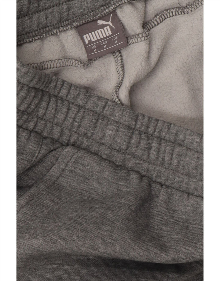 Calça esportiva masculina Puma Graphic Joggers cinza médio algodão manchado