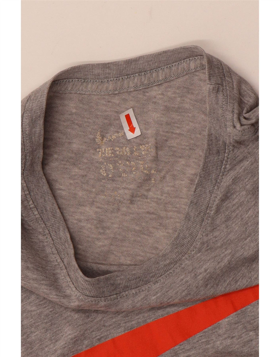 Camiseta Nike masculina gráfica grande cinza manchada
