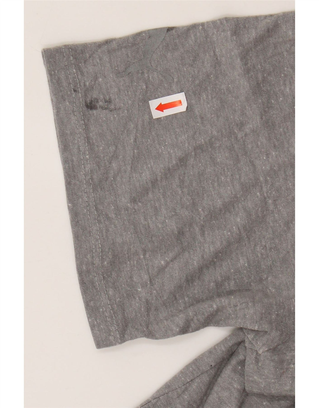 Camiseta masculina PUMA com estampa gráfica grande cinza manchada