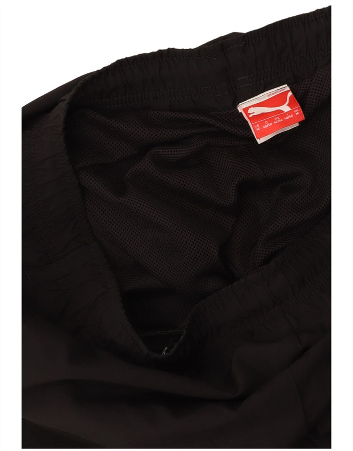 Calça de treino masculina PUMA Graphic Joggers médio preto