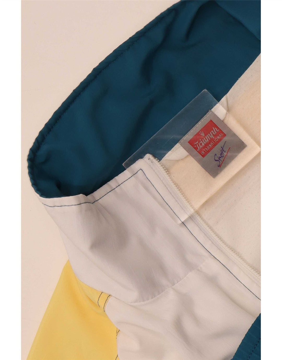 Jaqueta Triumph masculina com agasalho gráfico UK 42 grande bloco colorido azul