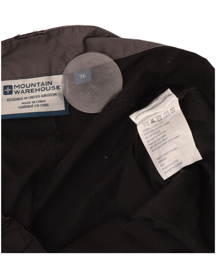 A carga reta das mulheres do armazém da montanha calça o poliéster preto W36 L30