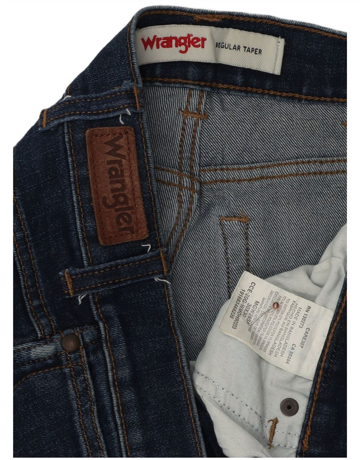 Jeans WRANGLER masculino regular cônico W30 L30 algodão azul