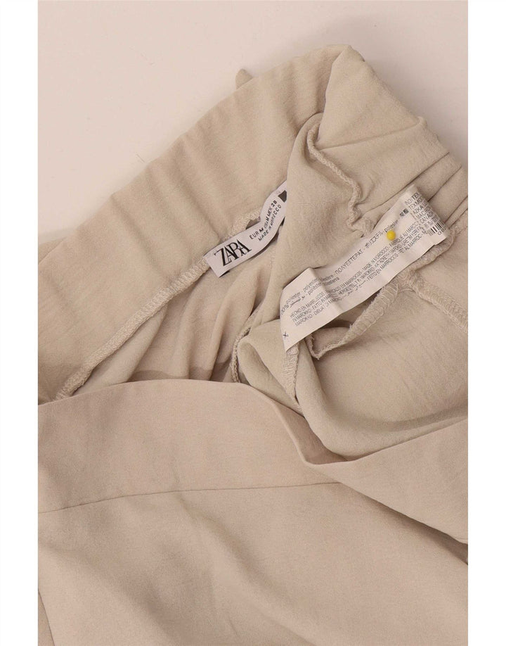 Calça feminina Zara com perna larga, médio W26 L30 poliéster bege