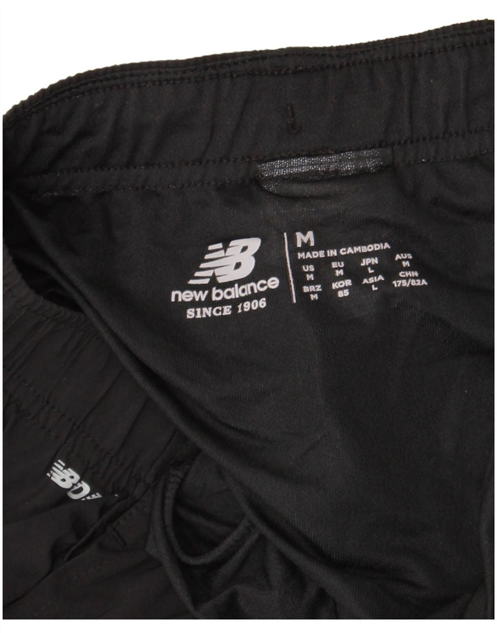 Shorts esportivos masculinos New Balance poliéster preto médio