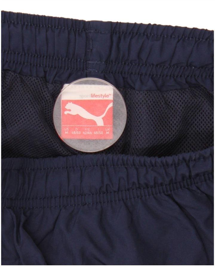 Calça de treino masculina Puma Graphic azul marinho médio