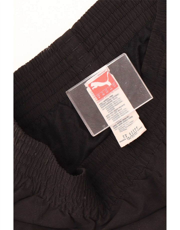 Calça de treino feminina Puma Joggers UK 12 poliéster preto médio