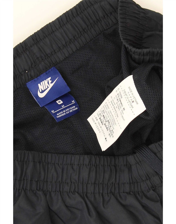 Calça de treino masculina Nike médio preto poliéster