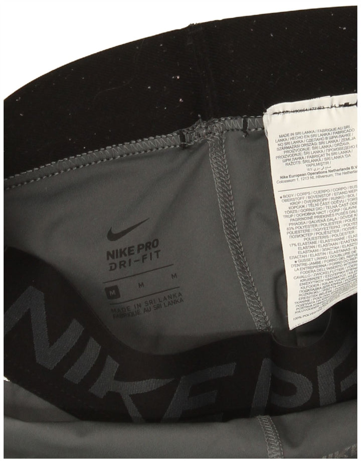 Leggings femininas Nike Dri Fit Graphic UK 12 poliéster cinza médio