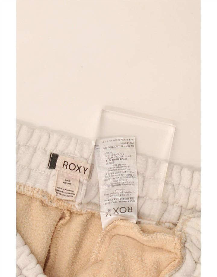 Calça esportiva masculina Roxy com estampa gráfica grande bloco colorido bege