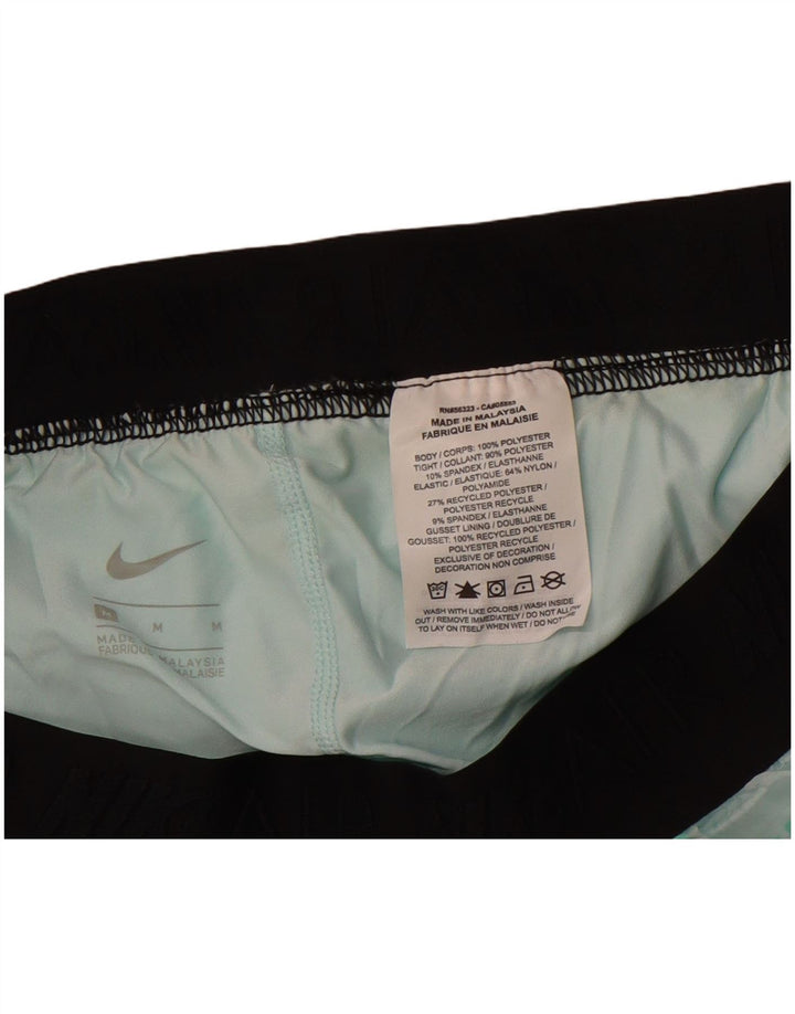 Shorts esportivos femininos NIKE Air Graphic UK 12 poliéster verde médio