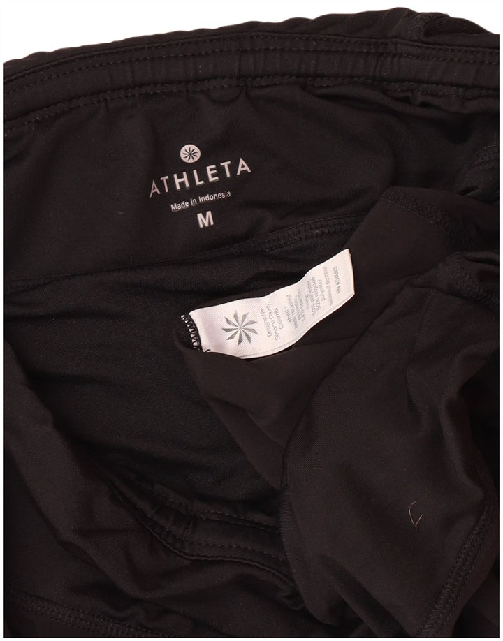 Shorts esportivos femininos ATHLETA UK 12 poliéster preto médio