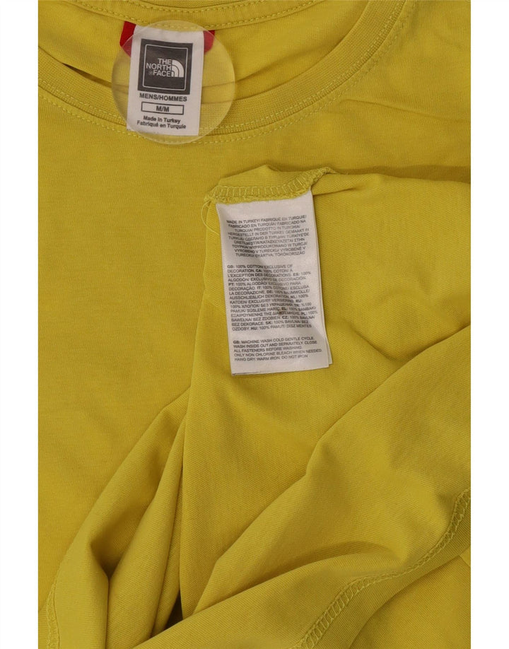 Camiseta gráfica masculina The North Face algodão amarelo médio