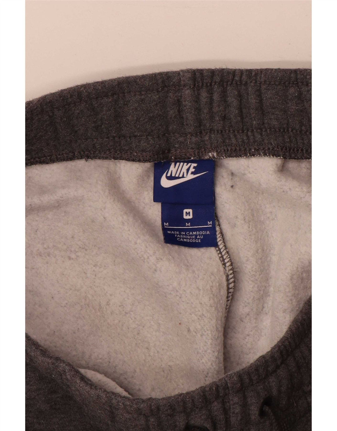 Calça de treino masculina Nike Joggers cinza médio algodão manchado