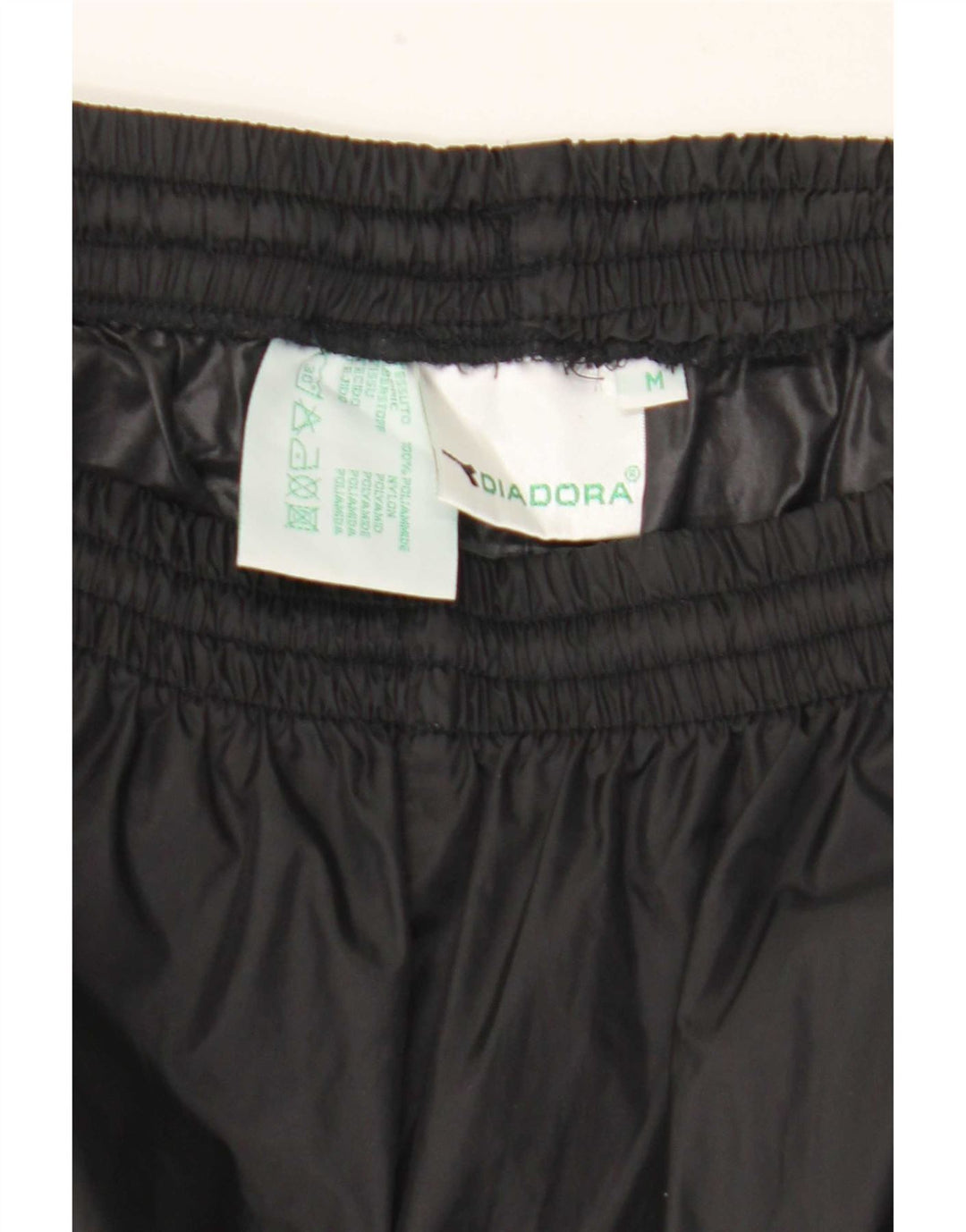 Calça impermeável masculina Diadora média preta poliamida