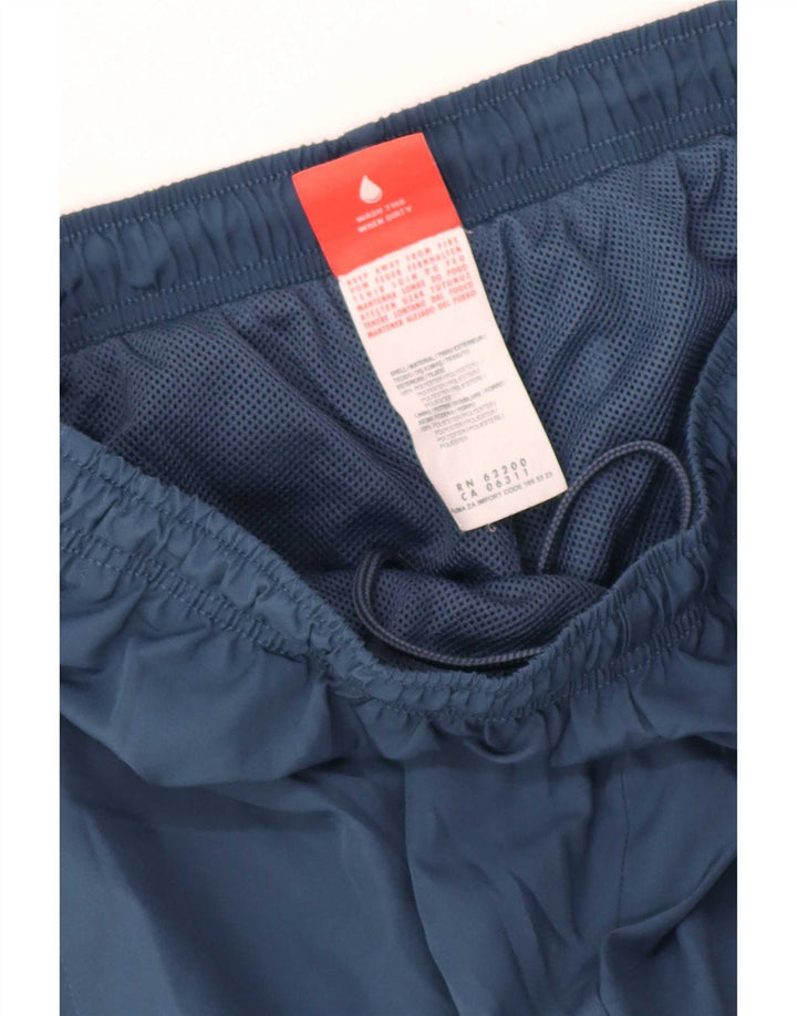 Calça de treino masculina Puma Graphic Capri médio azul marinho poliéster