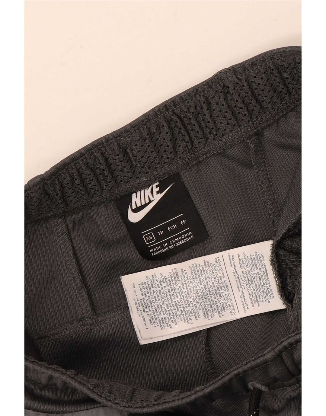 Calça de treino Nike masculina gráfica Joggers XS cinza colorblock poliéster