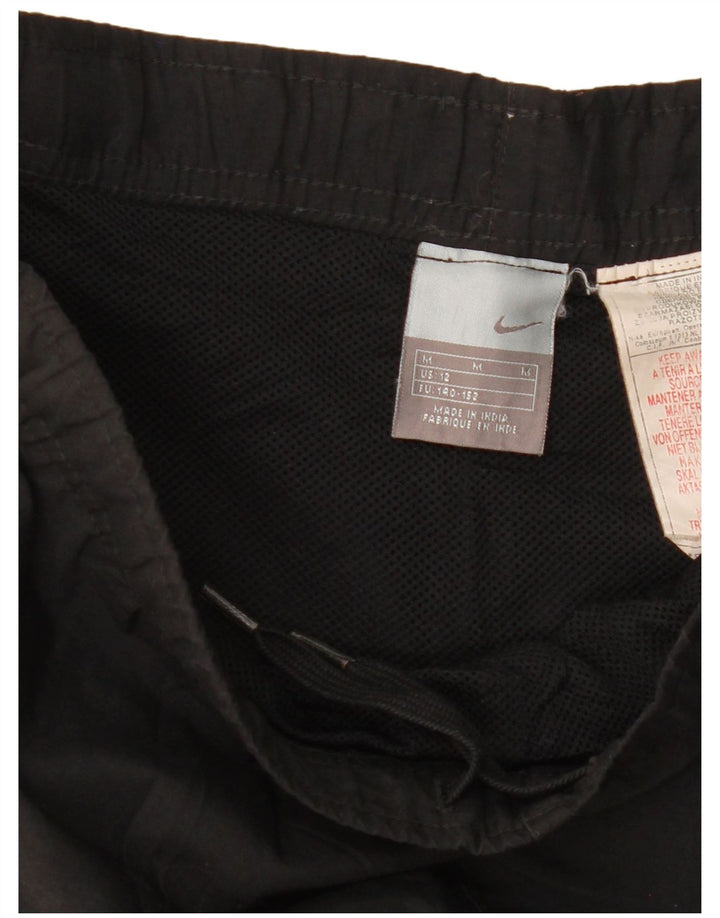 Calça de treino Nike Boys 11-12 anos médio preto colorblock poliéster