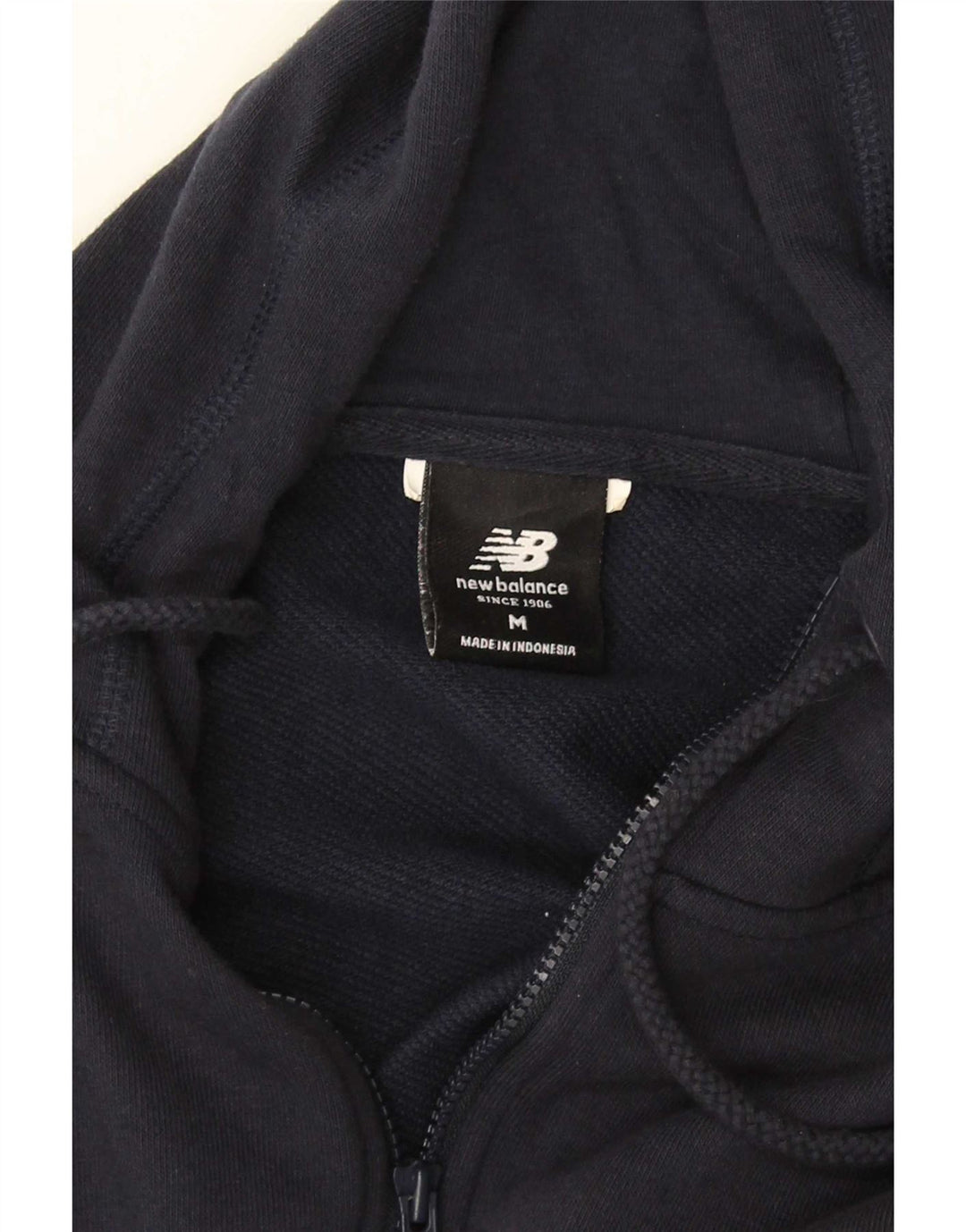 Suéter masculino New Balance com capuz e zíper médio azul marinho