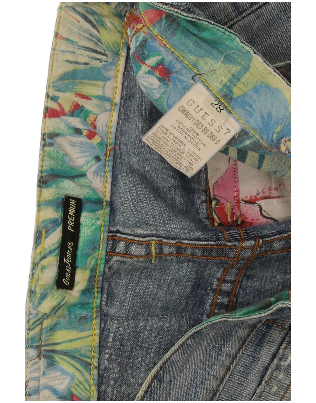 Guess Jeans femininos cortados desgastados W28 L24 algodão azul