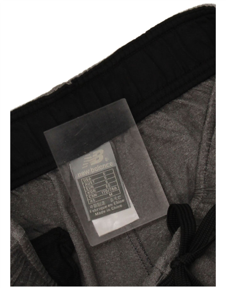 Calça de treino masculina New Balance poliéster cinza pequeno