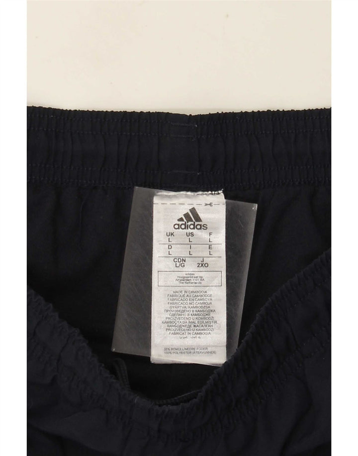 Calça de treino masculina Adidas grande poliéster azul marinho