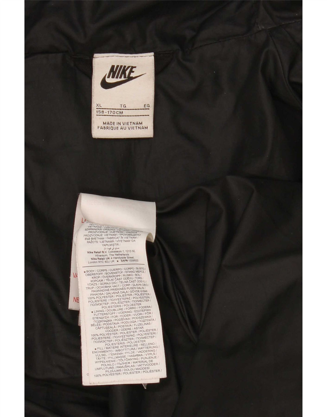 Jaqueta acolchoada com capuz Nike Boys 13-14 anos XL preto poliéster