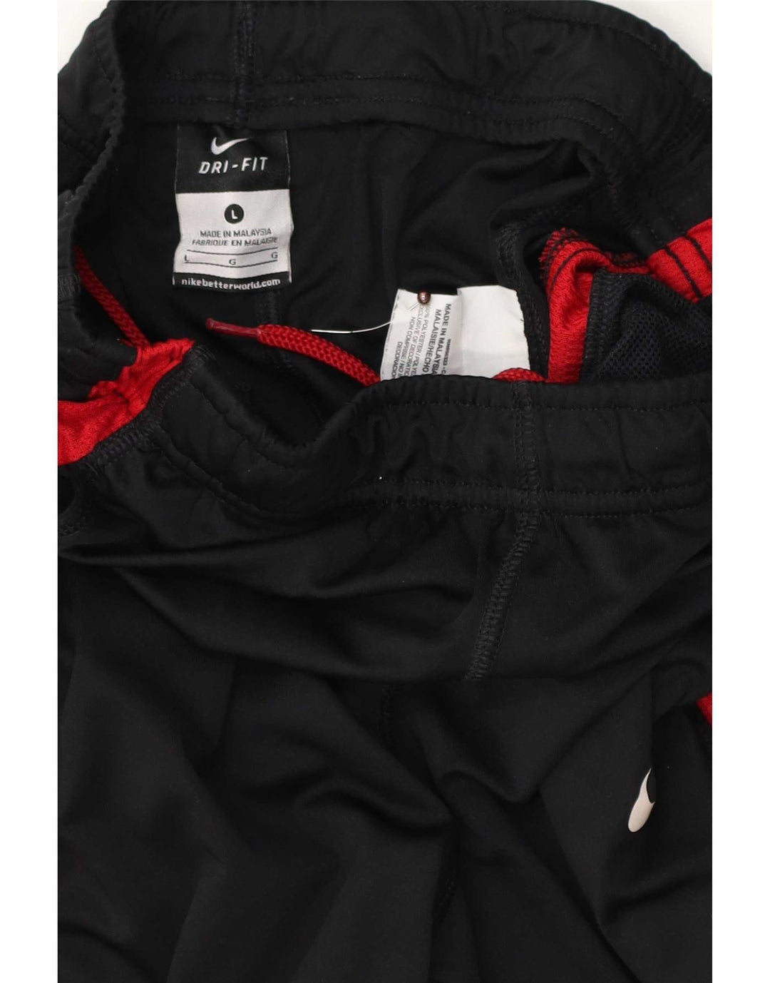 Calça de treino regular Nike Boys 12-13 anos grande bloco colorido preto