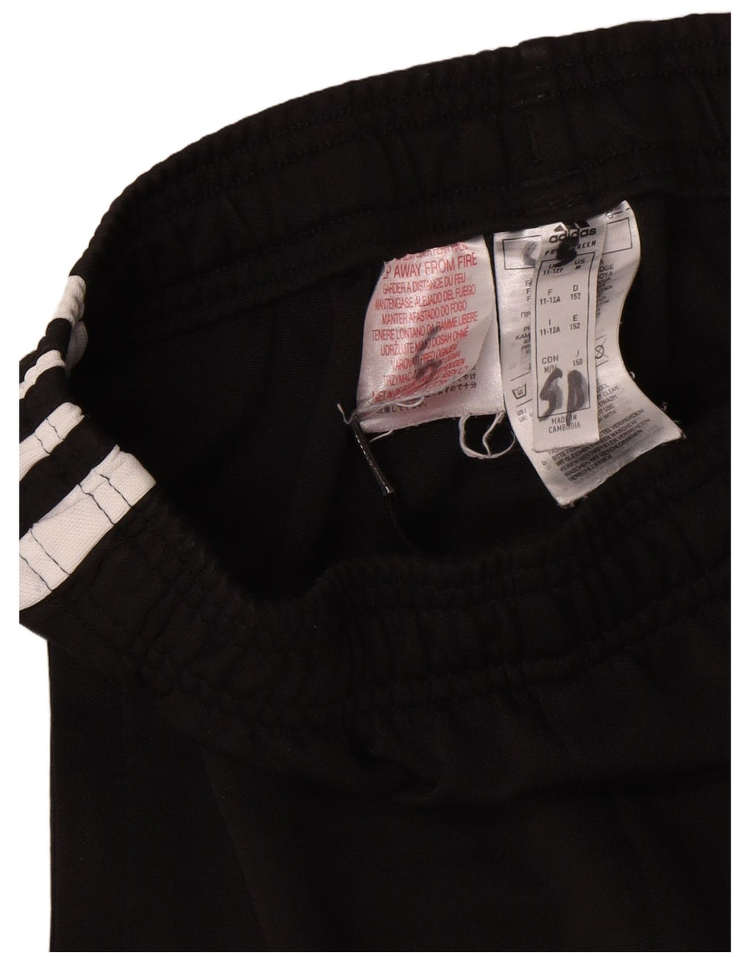 Calças de treino Adidas Boys Graphic 11-12 anos preto poliéster