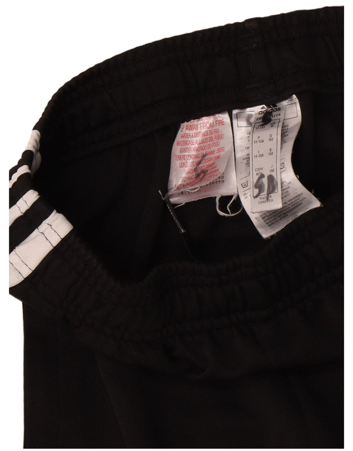Calças de treino Adidas Boys Graphic 11-12 anos preto poliéster