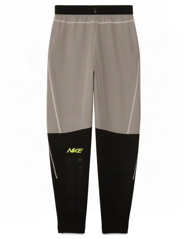 Calça de treino Nike masculina Dri Fit Graphic pequena cinza colorblock