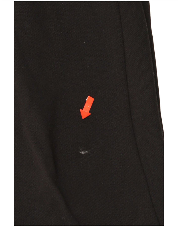 Calça esportiva masculina Puma Graphic Joggers pequena preta