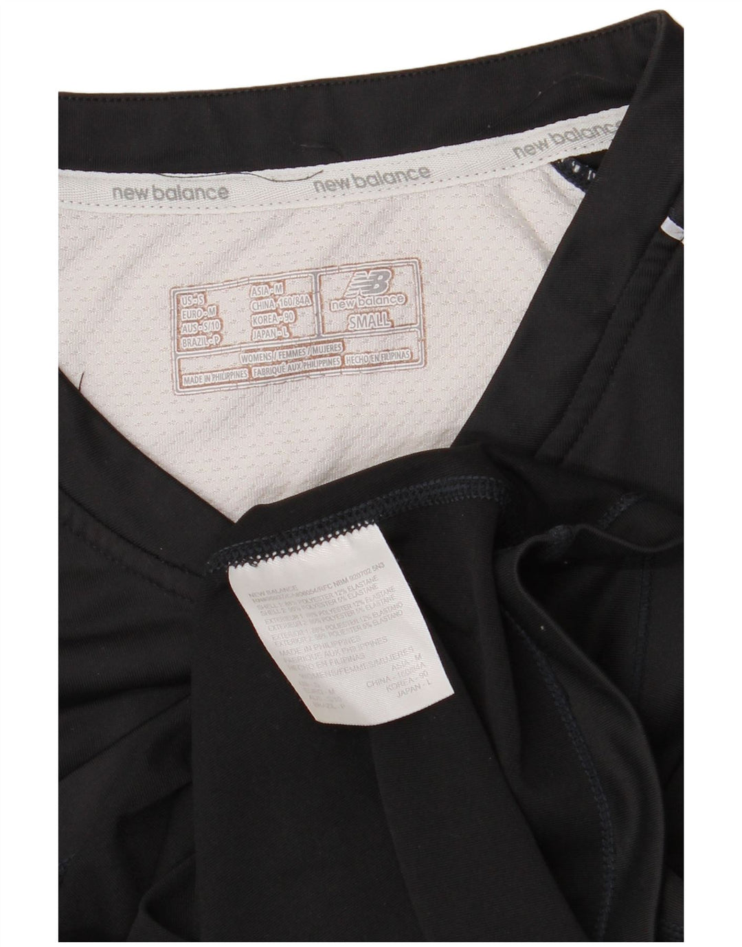 Camiseta feminina New Balance UK 10 pequena preta colorblock poliéster