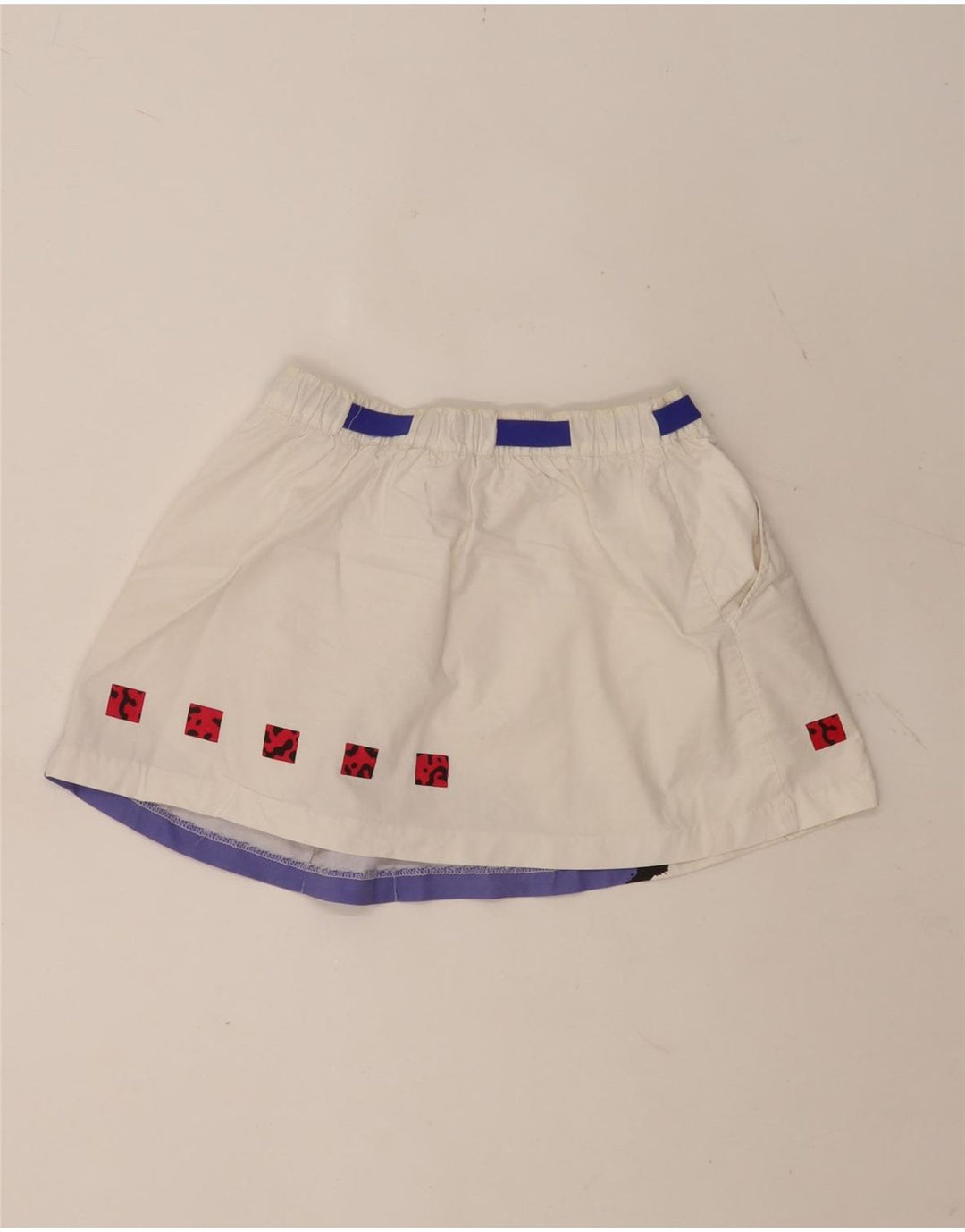 Saia feminina Nike média W28 branca colorblock algodão