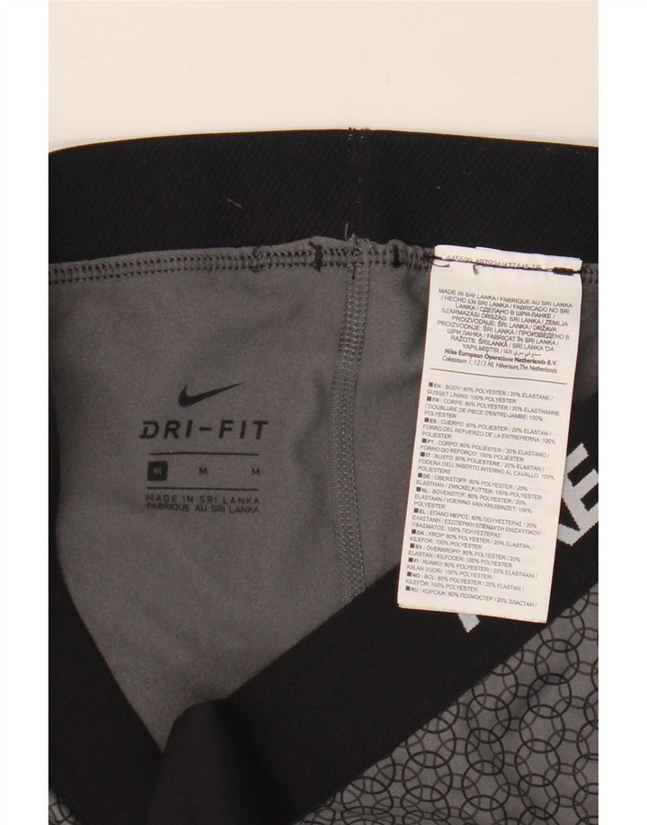 Leggings femininas Nike Dri Fit Graphic UK 12 poliéster geométrico cinza médio
