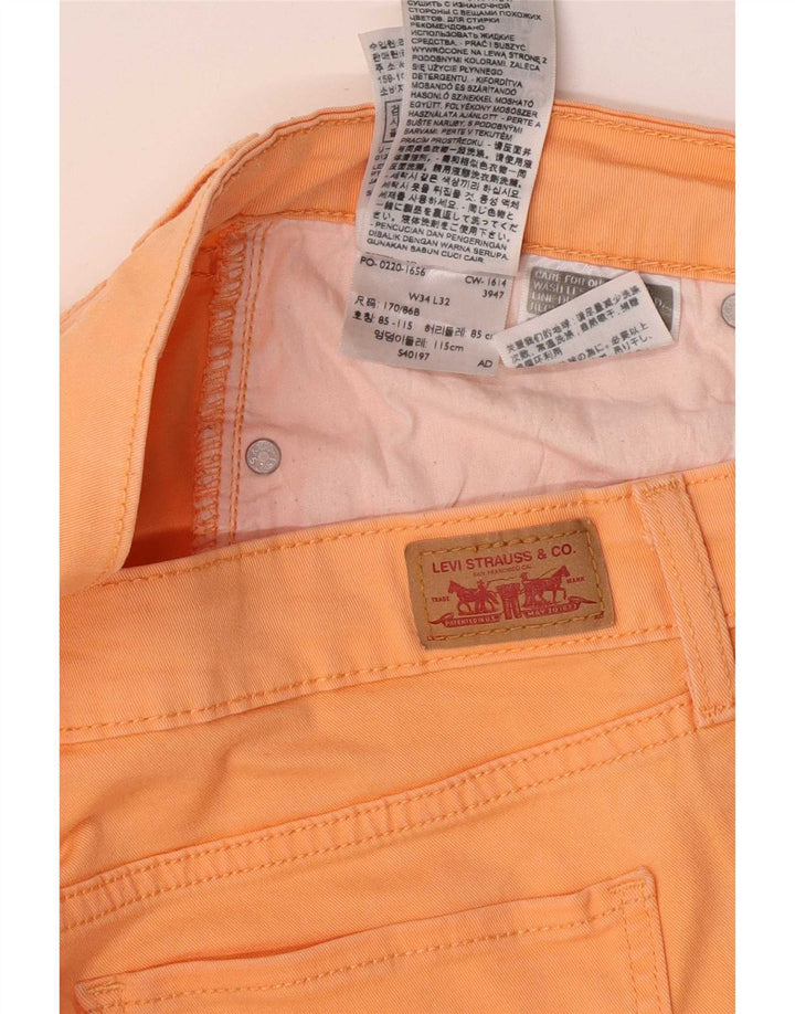 Calça jeans feminina Levi's W34 L32 laranja algodão