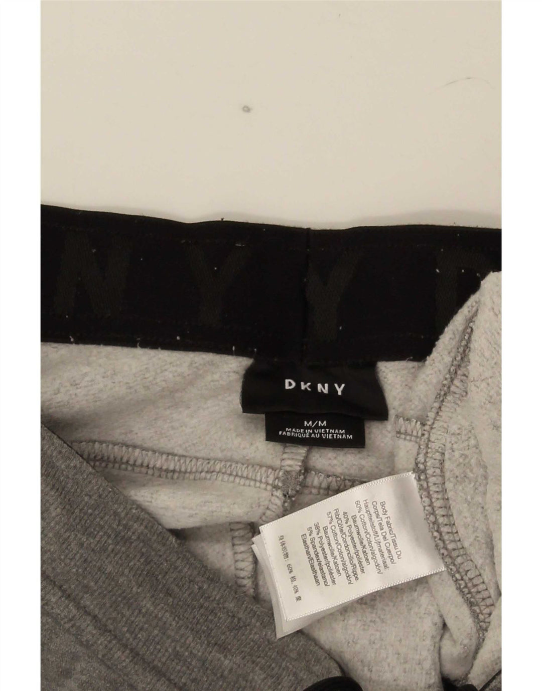 Calça esportiva masculina Dkny com estampa gráfica e algodão manchado cinza médio